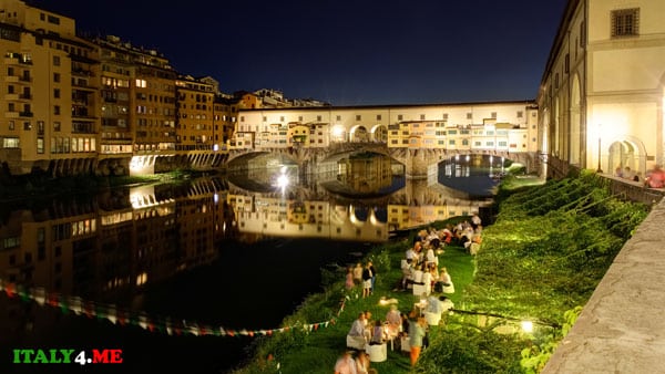 Embankment in Florence view of Ponte Vecchio Bridge