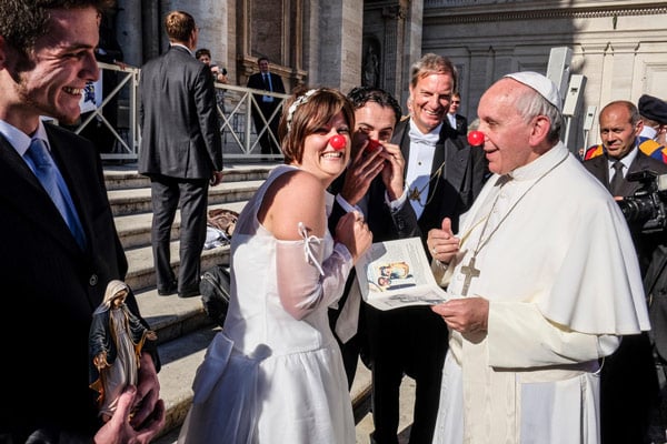 Pope Francis communicates with the faithful