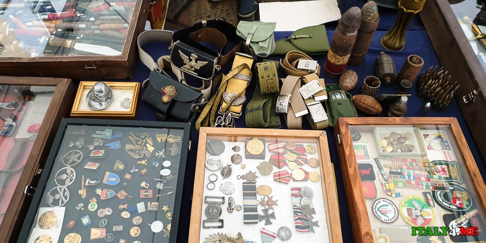American and German military casings, belts, and medals