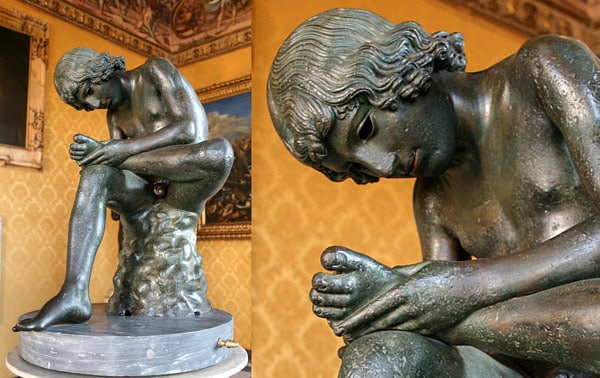 bronze roman sculpture of a boy removing a splinter