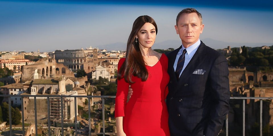 Monica Bellucci and Daniel Craig in Rome with the Colosseum in the background