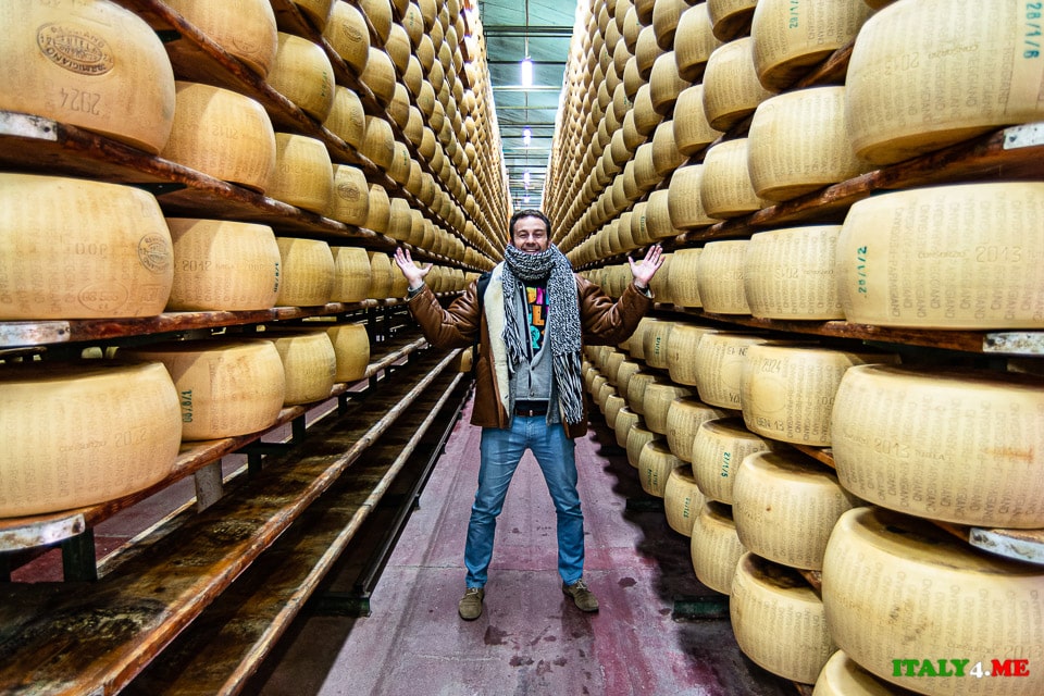 Artur Yakutsevich at a cheese factory in Italy, Parmesan warehouse